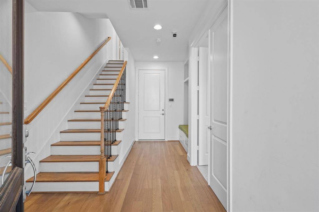Elegance from the moment you arrive. Hardwood floors and a stylish staircase set the tone