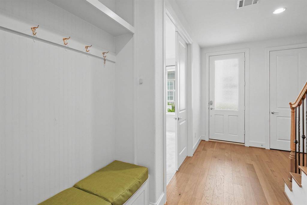 Elegance from the moment you arrive. Hardwood floors and a stylish staircase set the tone