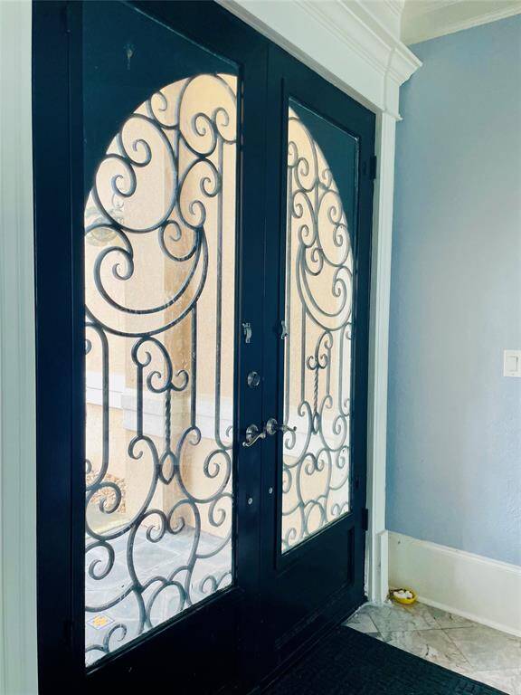 Double doors great you at entry.