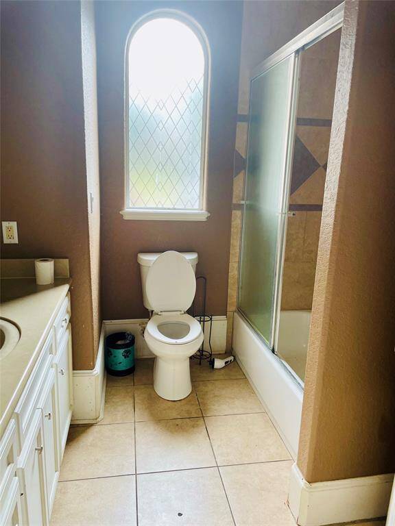 Secondary restroom off on the first floor