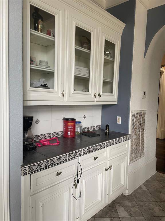 Built-in cabinets off of formal dining