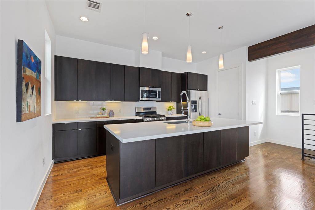 Breakfast bar with seating for six. Additional cabinets on this side of the island, maximizing your storage.