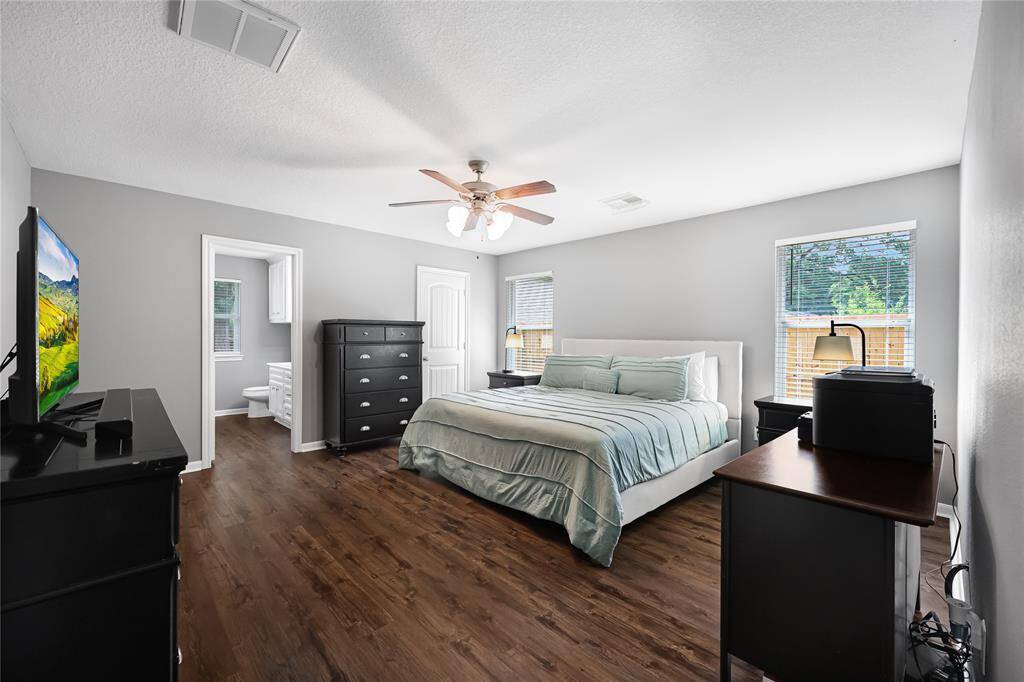 Primary bedroom with large walk in closet & attached private bath