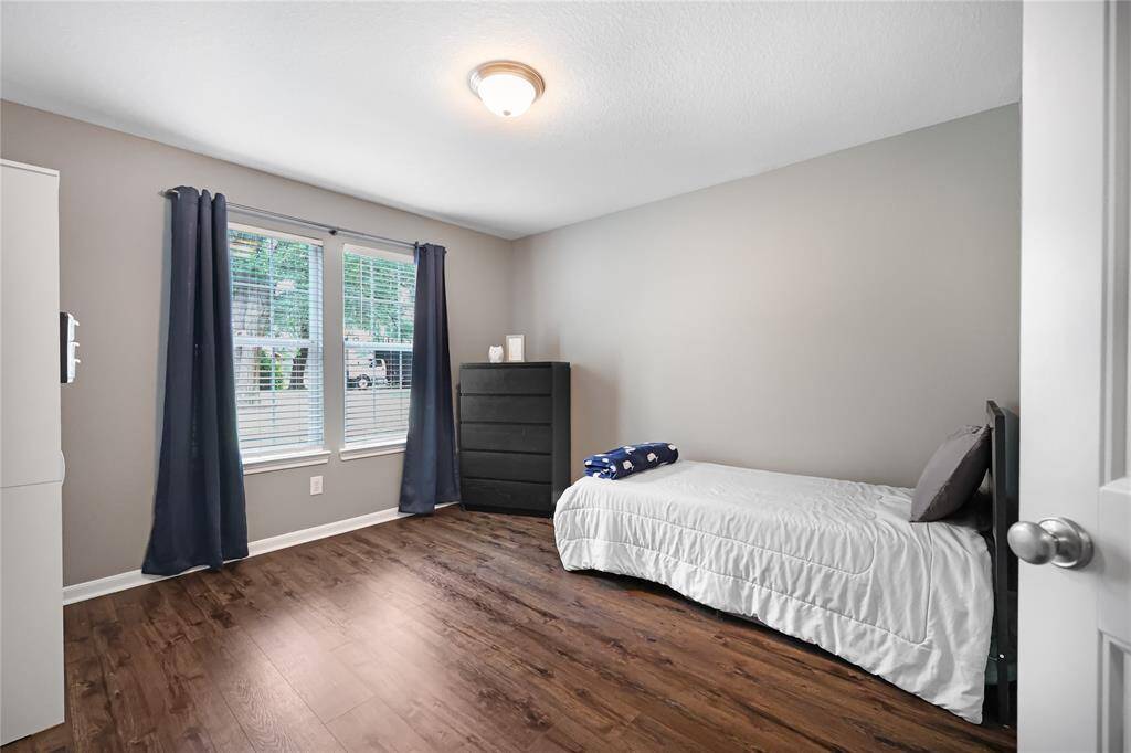 Secondary bedroom with walk in closet