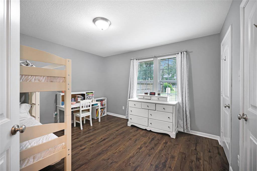 Another secondary bedroom with dual closets