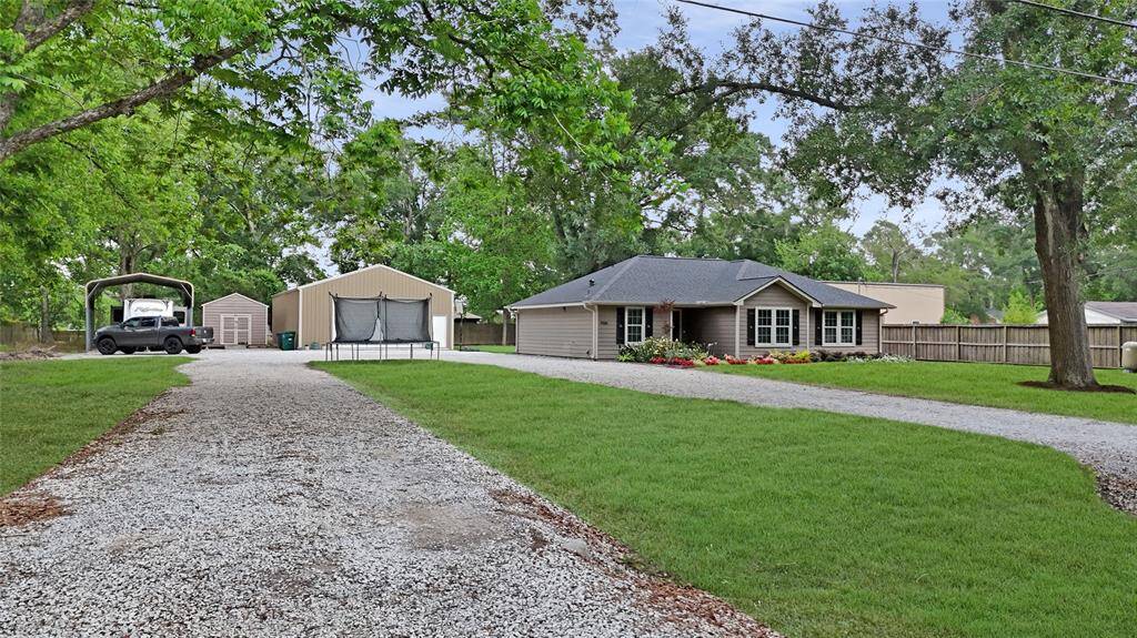 Long u-shaped gravel driveway