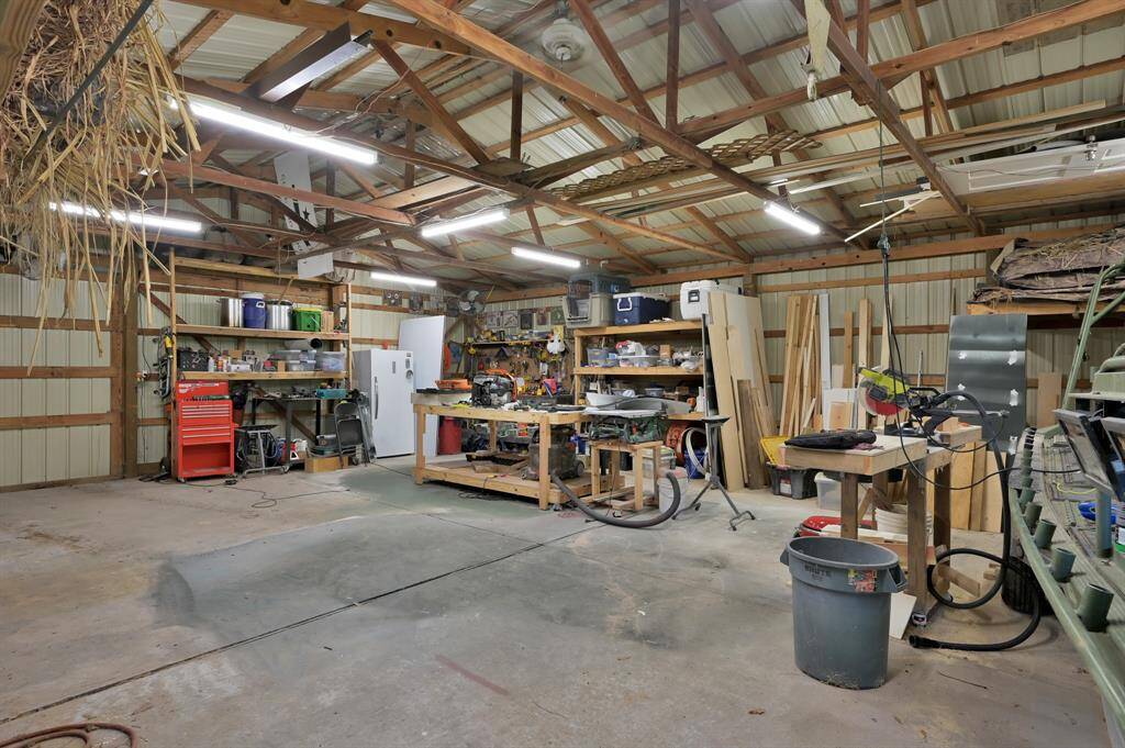Your fully powered 1200 Sq Ft. workshop. The potential for this space is endless and has had a facelift with additional lighting and built in shelves. Please see list in the attachments for exclusions.