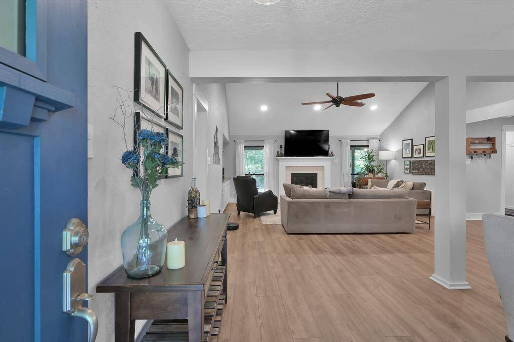 The home with the blue door is modern and charming - the best of both worlds.