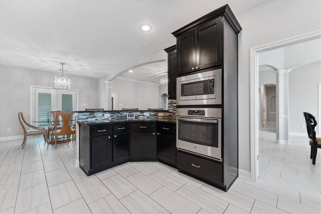 Enter the kitchen through the formal dining room or the breakfast nook.