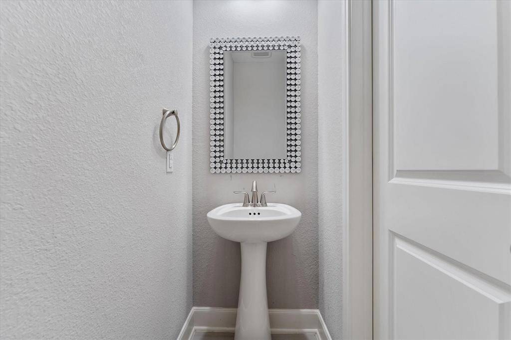Half bathroom conveniently located right off the kitchen!