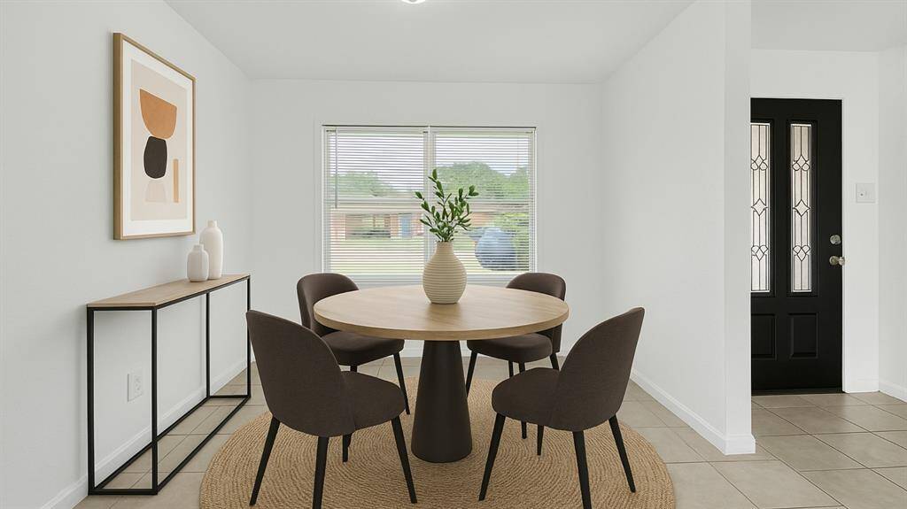 The kitchen includes a breakfast nook that's canvassed by a a window to illuminate the space.***Virtually Staged***