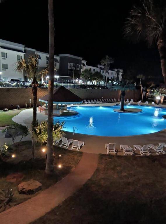 The newly renovated resort pool is lovely at night.