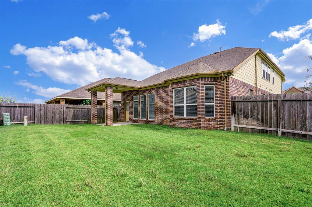 Enjoy the privacy of no neighbors to the right—this corner lot backyard offers plenty of space to relax, play, and entertain.