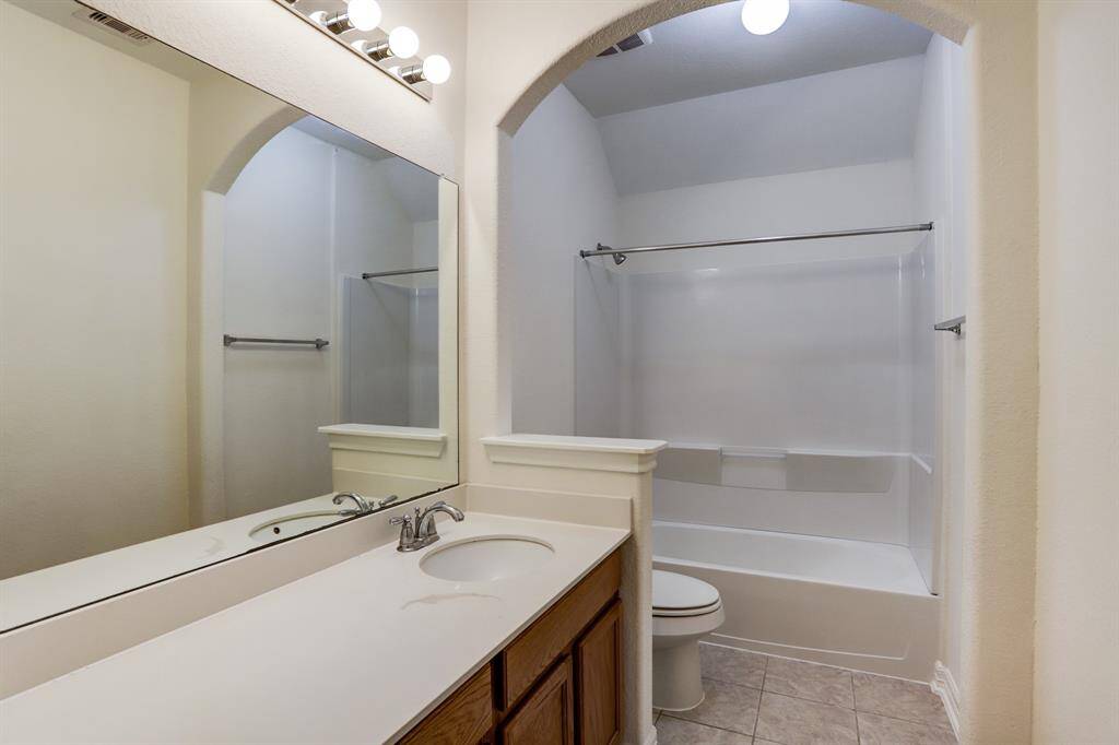Upstairs secondary bathroom—clean design and everything you need for daily comfort.