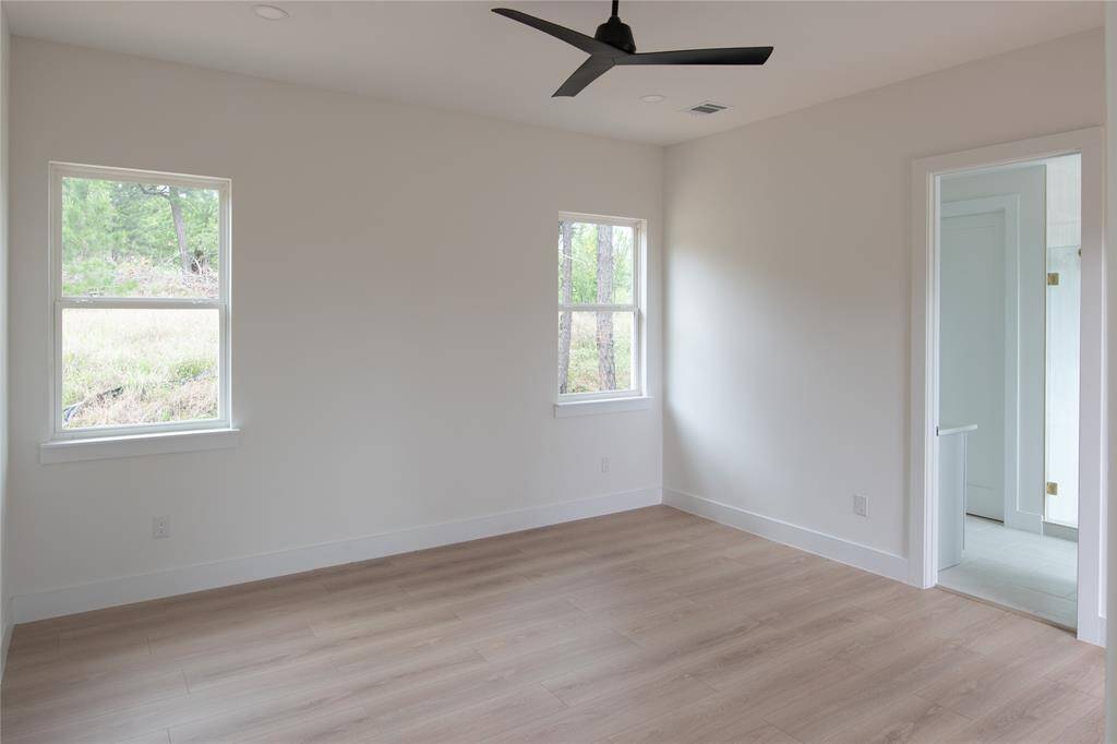Large primary suite with private deck.