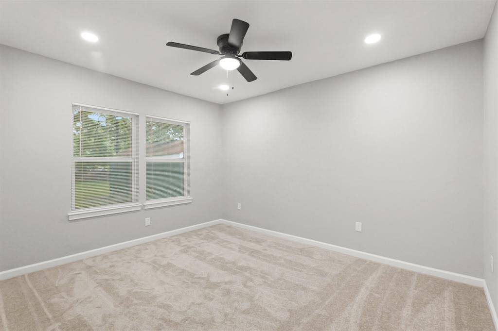 How perfect is this primary suite? Spacious and filled with natural light, this serene retreat offers the ultimate escape, promising comfort, tranquility, and pure relaxation.