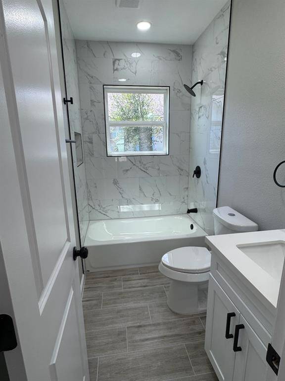 Beautifully updated secondary bathroom featuring a sleek tub/shower combo, perfect for both quick rinses and relaxing soaks.