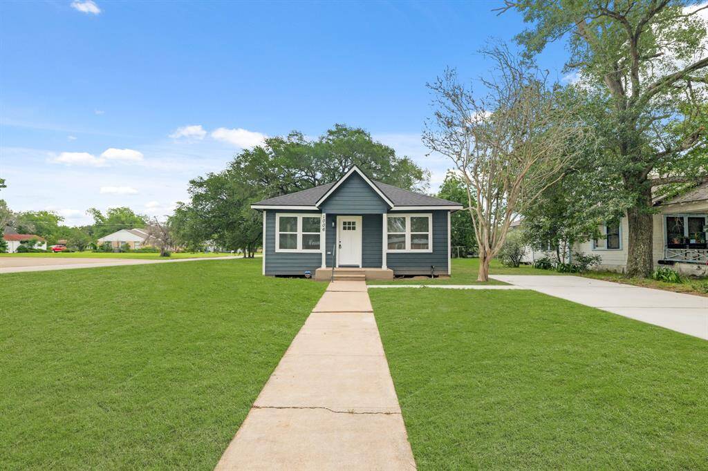 This nicely updated home sits on a large lot with mature trees that provide great shade and classic curb appeal.