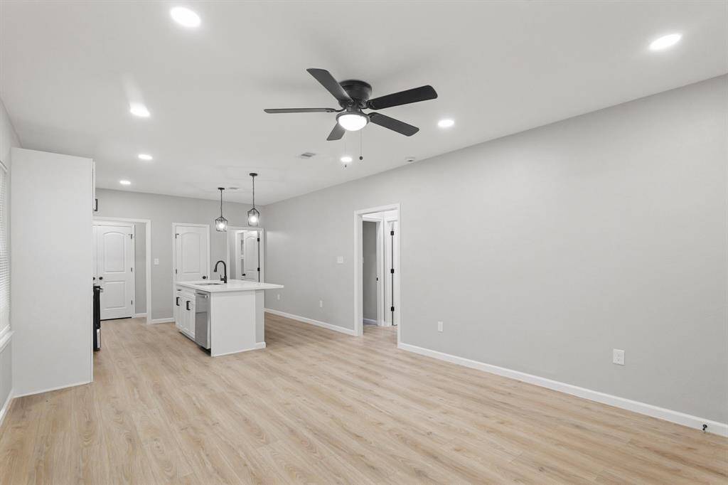 New flooring, fresh paint, and an updated kitchen all come together to enhance the home's modern appeal and move-in readiness.