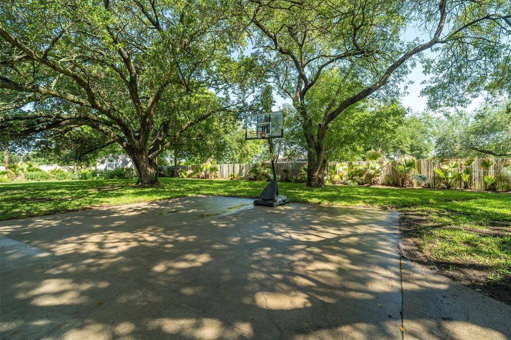 Driveway space, enough room for a basketball court!