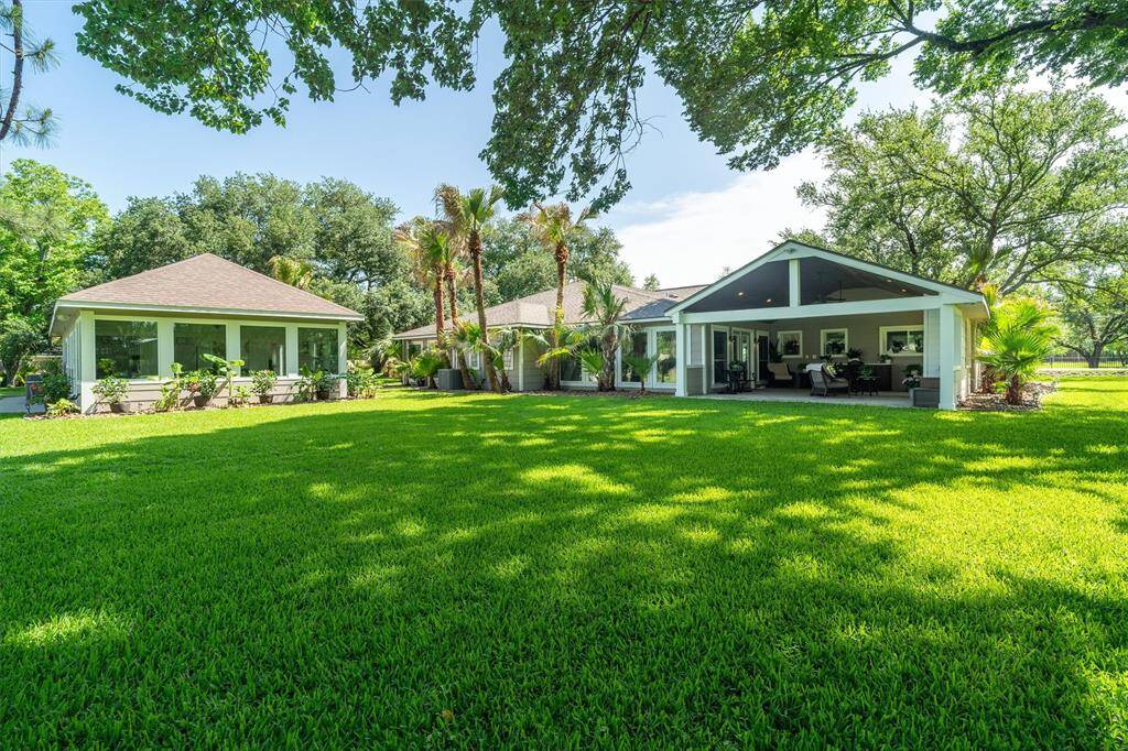Shade provided by mature trees over your 1.11 acres of property!