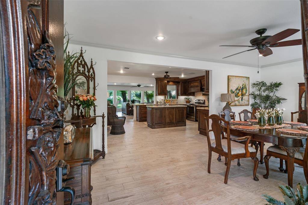 Welcome home! Open concept- from the front door you are greeted by the dining room looking on into the grand kitchen