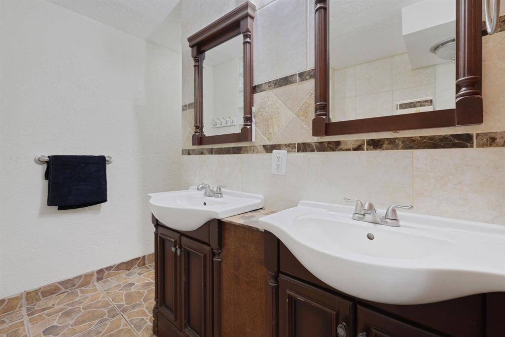 Modern Bathrooms. Three full bathrooms featuring modern fixtures and finishes for comfort and style.