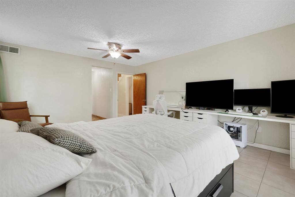 Primary Bedroom Suite. Generously sized primary bedroom with ensuite bathroom and walk-in closet.