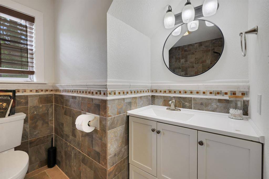 Modern Bathrooms. Three full bathrooms featuring modern fixtures and finishes for comfort and style.
