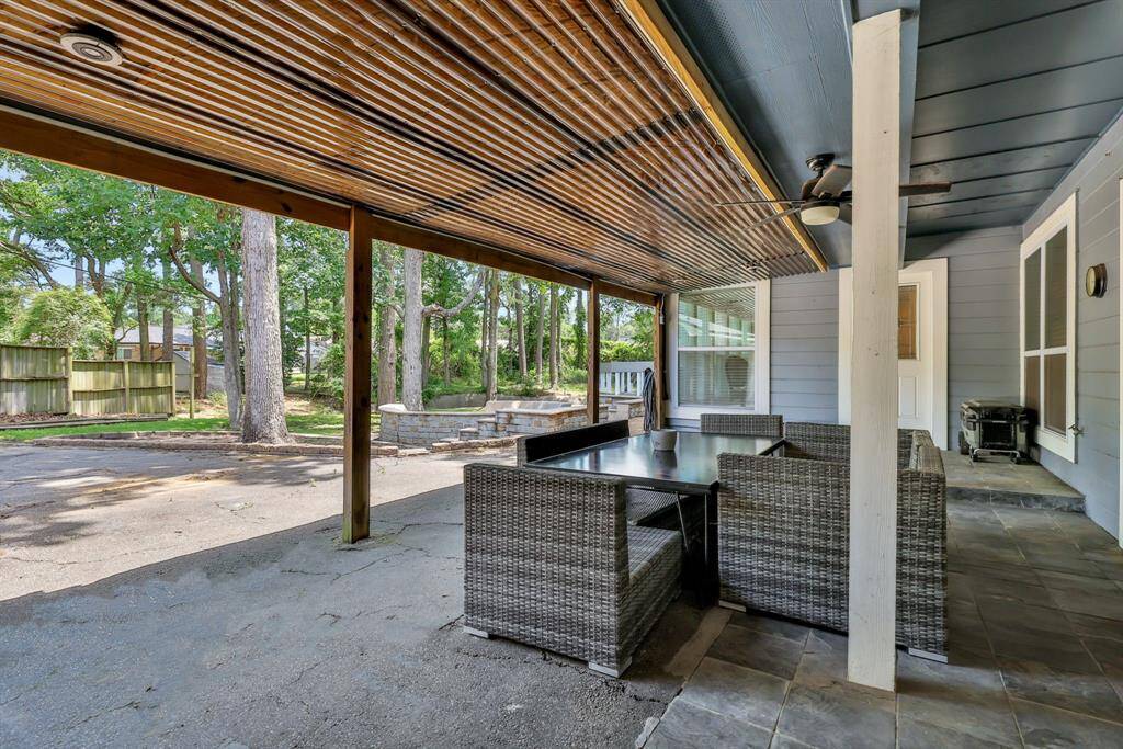 Covered Patio. Outdoor covered area ideal for dining al fresco or relaxing in the shade.