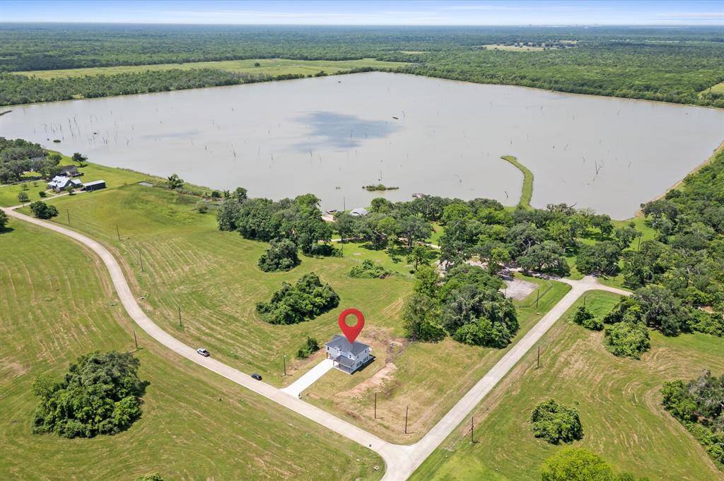Welcome to your dream home! 106 Pony Trail. Enjoy breathtaking views to the lake and recreational area.
