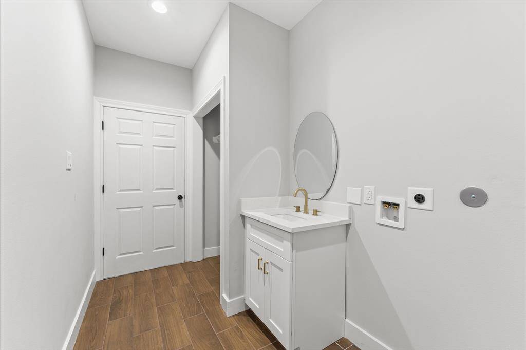 Laundry area with space for full-size washer/dryer.