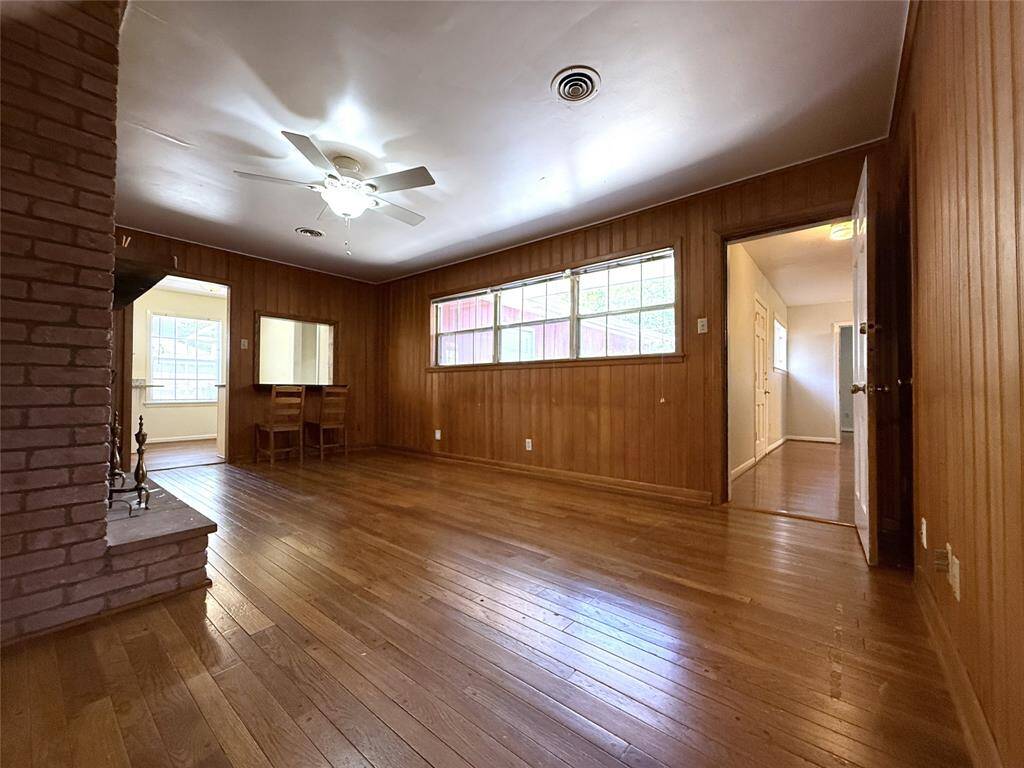 In the family room, a door opens out from the 1st bedroom.