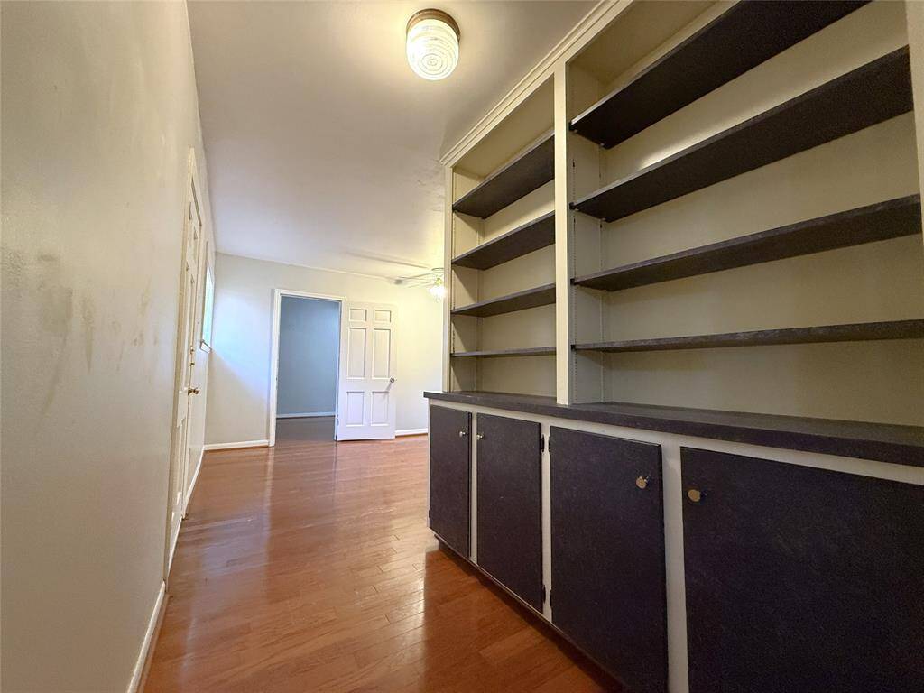 The entry foyer of the 1st bedroom offers built-in shelving/cabinets.