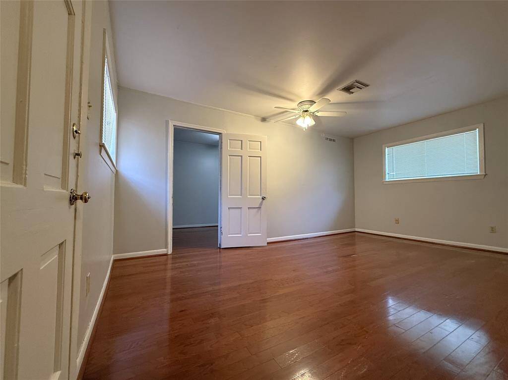 In the 1st bedroom, on the opposite side, the door opens in from the home-office/bonus room.