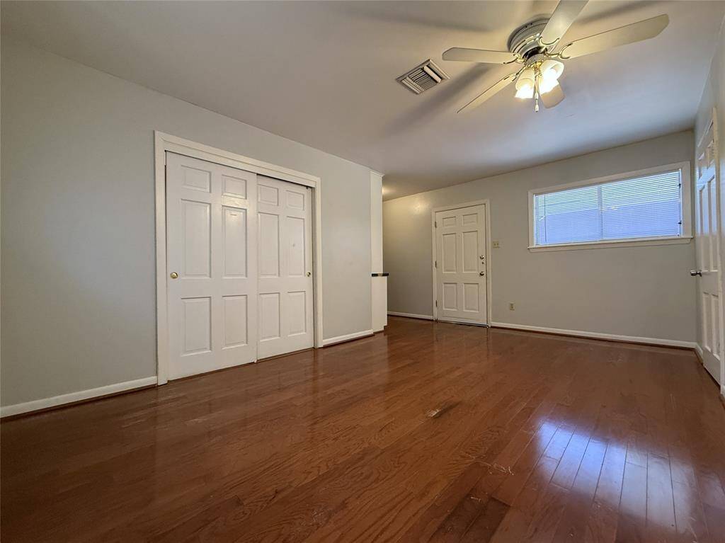Another view of the 1st bedroom, the door on the wall with the window opens in from the patio.