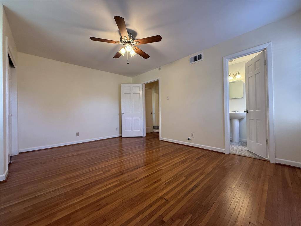 The front bedroom also offers a private bath,
