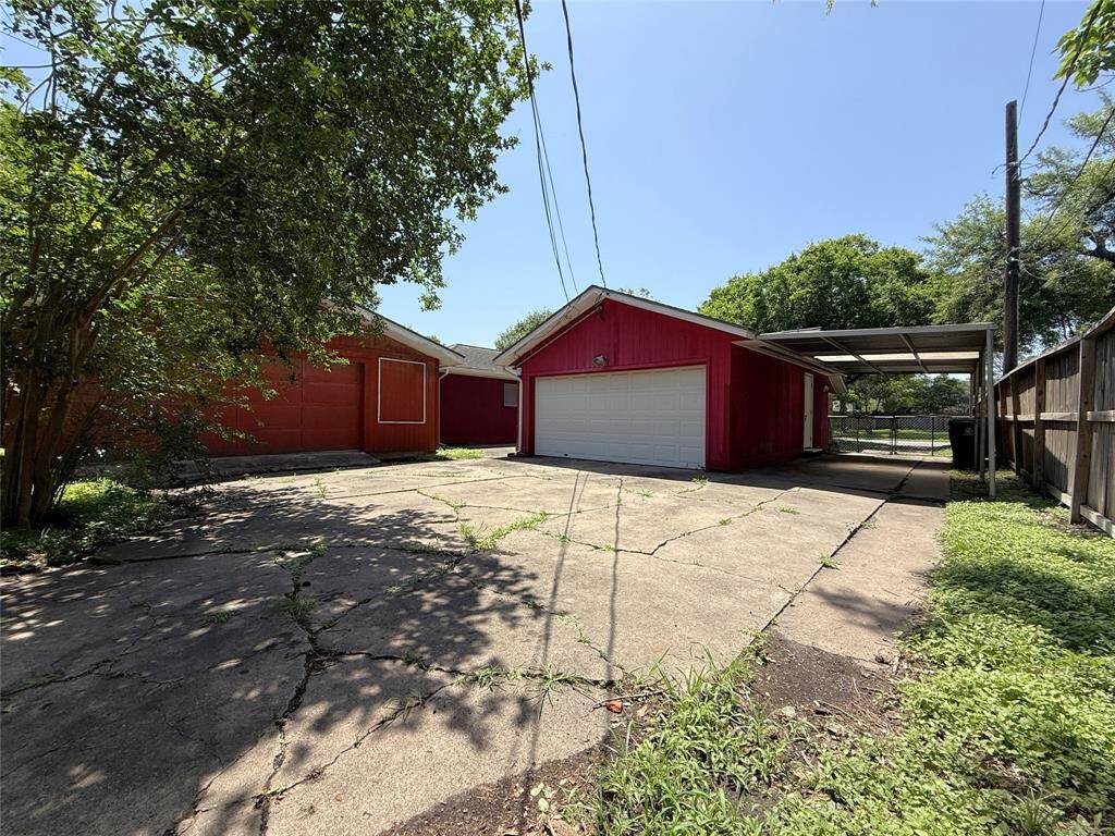 For your vehicles, there is a side carport, an attached garage and a detached garage.