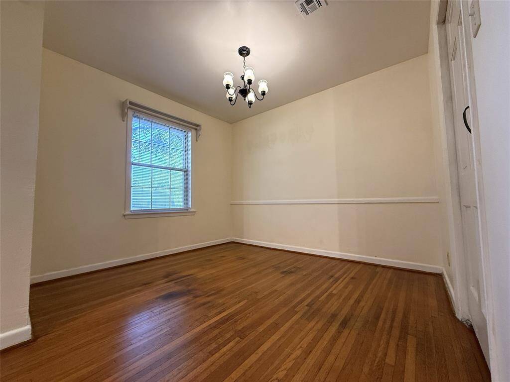 A closer look at the dining room which offers a chair rail.