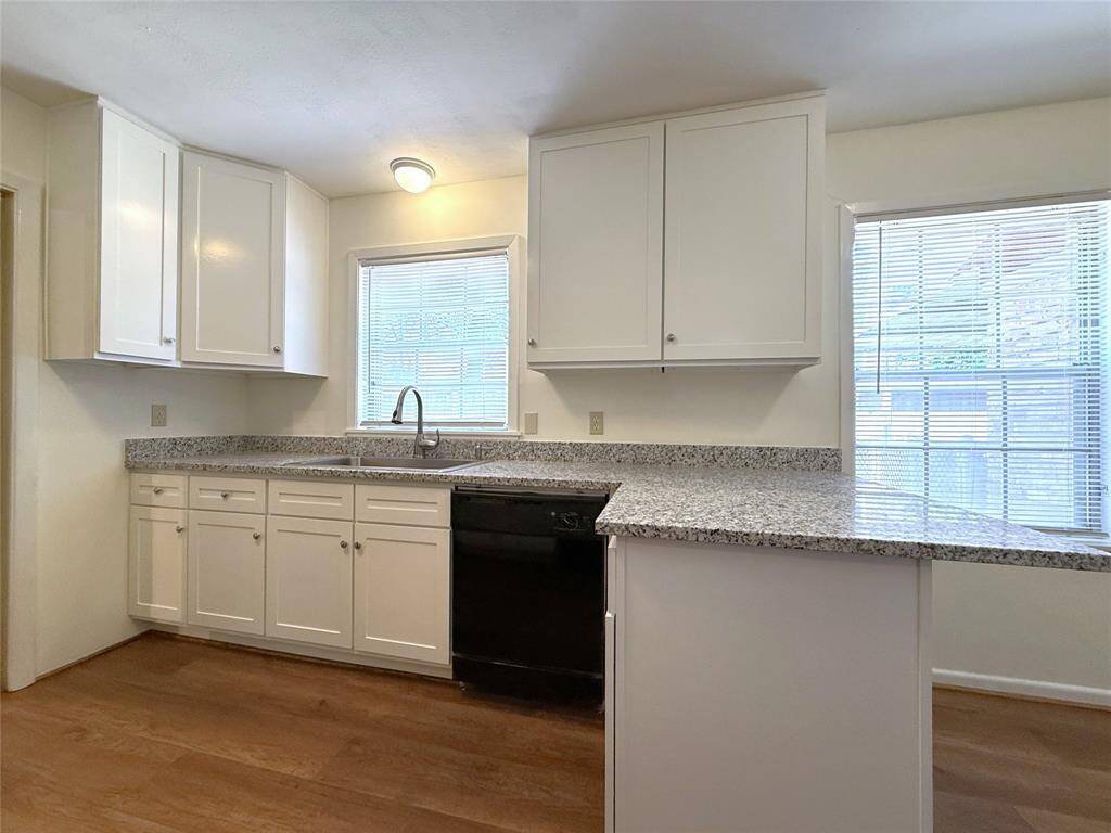 Granite counter tops, breakfast bar & luxury vinyl plank flooring.