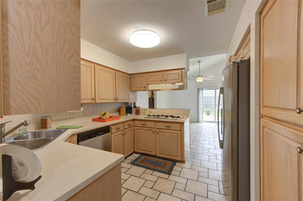Nice flow to the kitchen. Double windows add brightness to the space.
