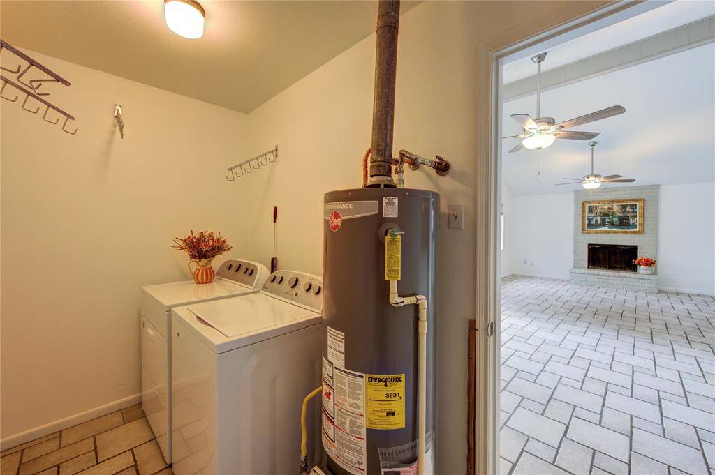 Enter the laundry room off of the garage. Lots of room to make it your own. Could double as a mud room.