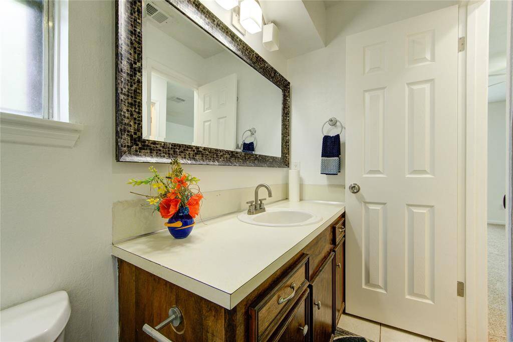 Solid wood cabinet with upgraded mirror and lights.