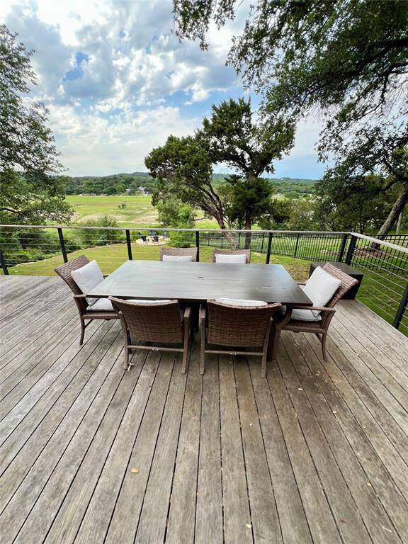 Enjoy easy water access with a charming limestone staircase leading to the lake. Note: Current water levels are below capacity.