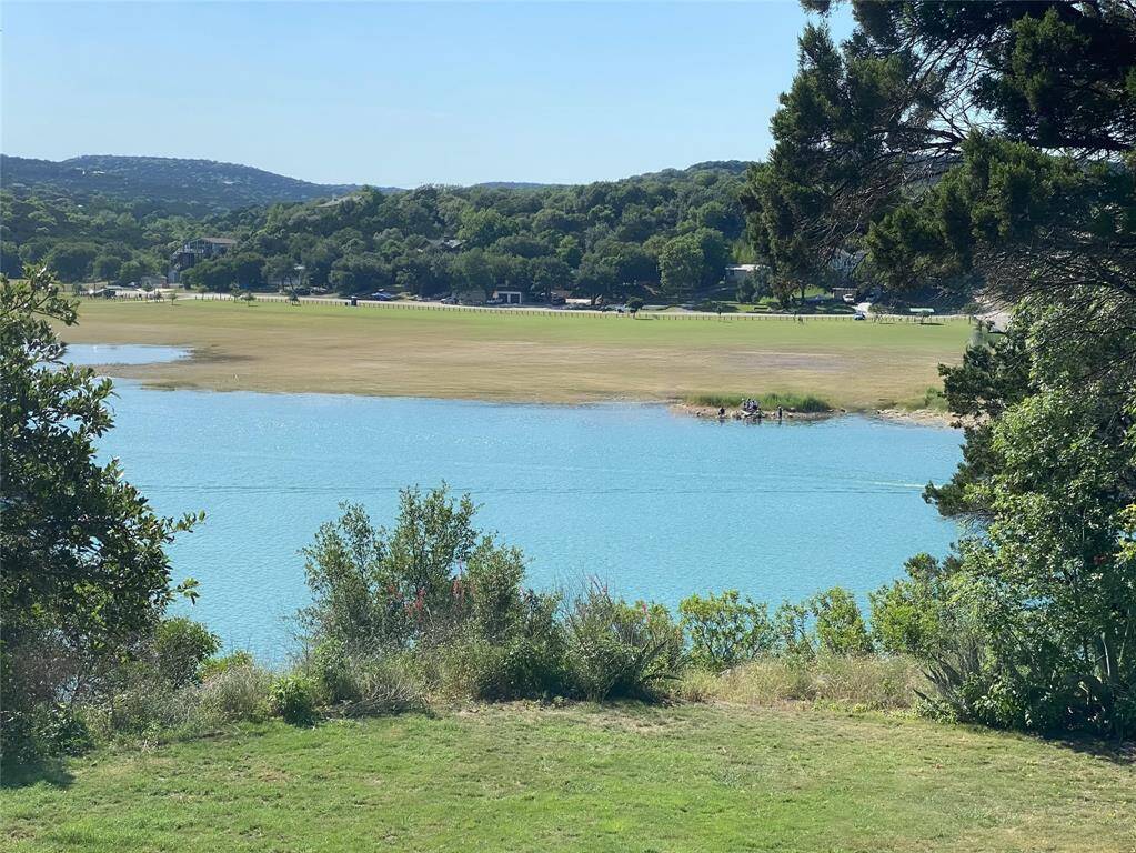 This photo showcases a beautiful view of the lake at its full capacity, offering a picturesque setting. Please note, the lake it not currently at full level.