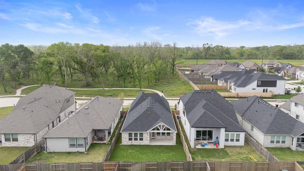 Private backyard ideal for relaxing or entertaining in your own space—plus, enjoy the tranquility of the preserve just across the street from the front of the home.