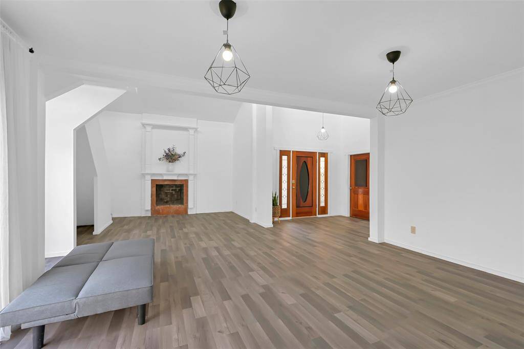 Spacious, bright living area with modern lighting is  Ideal for comfortable living and entertaining.