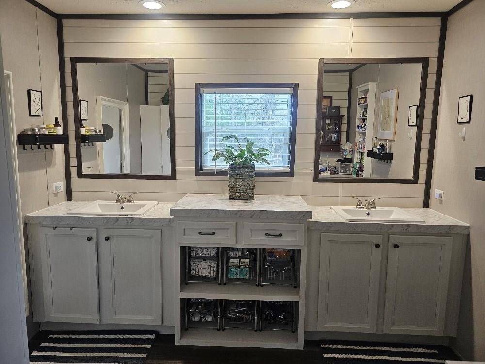 Primary Bath features two sinks and plenty of storage