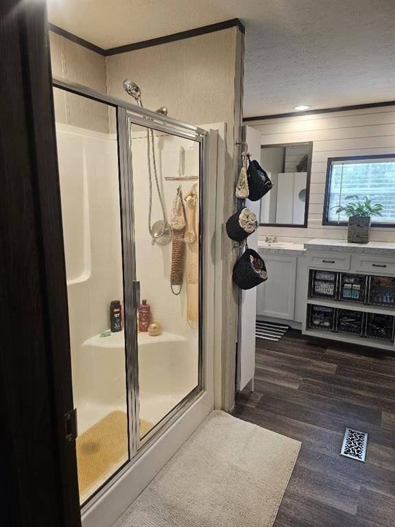 Large walk-in shower across from the water closet.