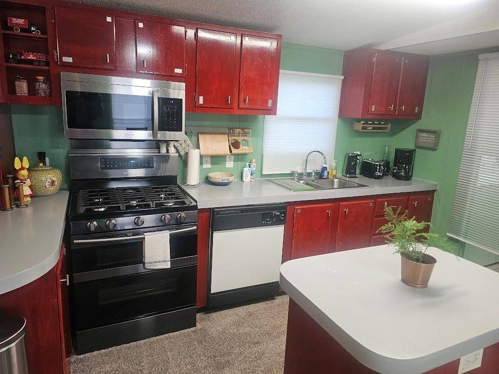 Guest house kitchen with recent convection oven and microwave